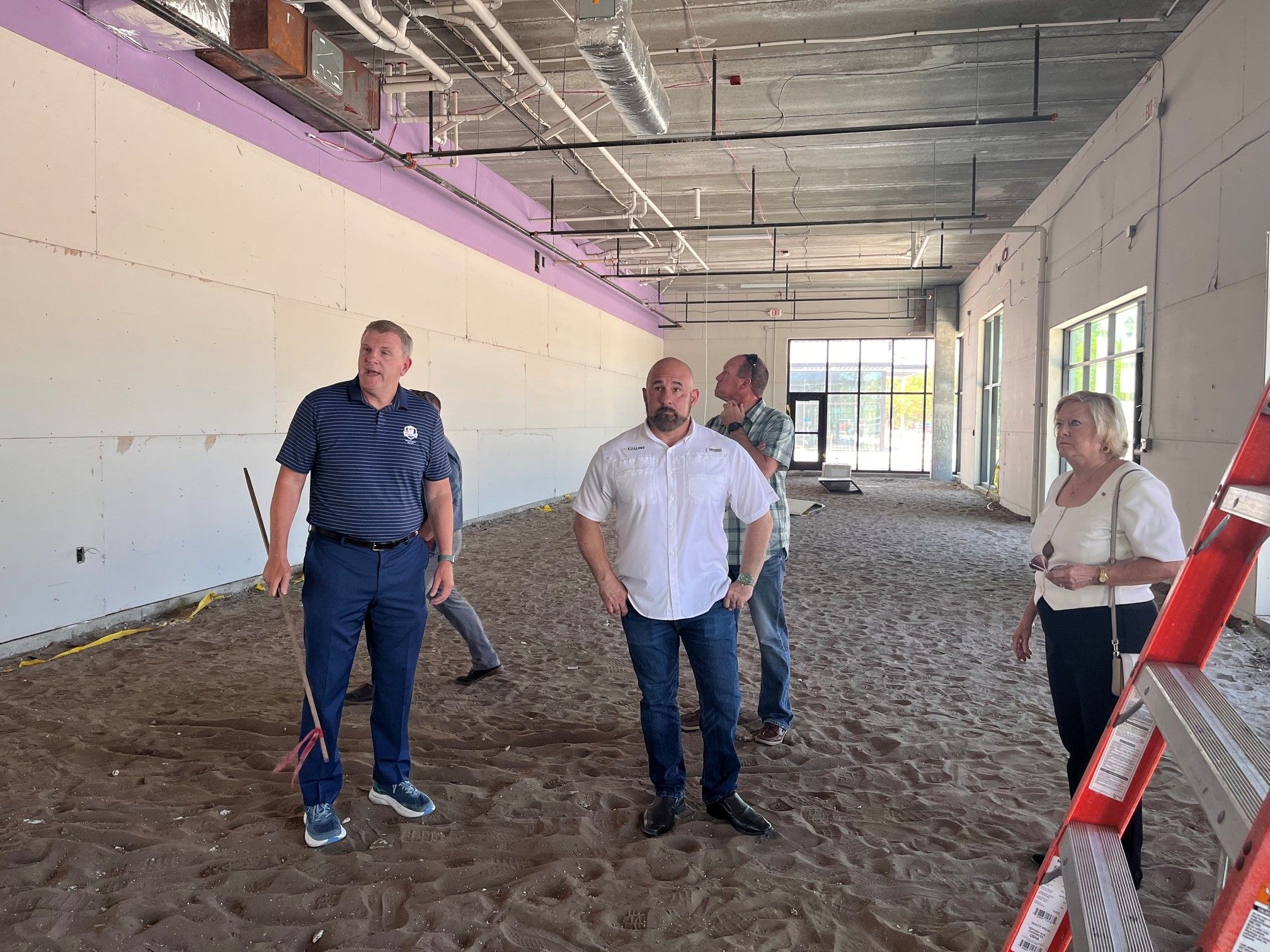 Florida Lieutenant Governor Jay Collins tours the promenade.