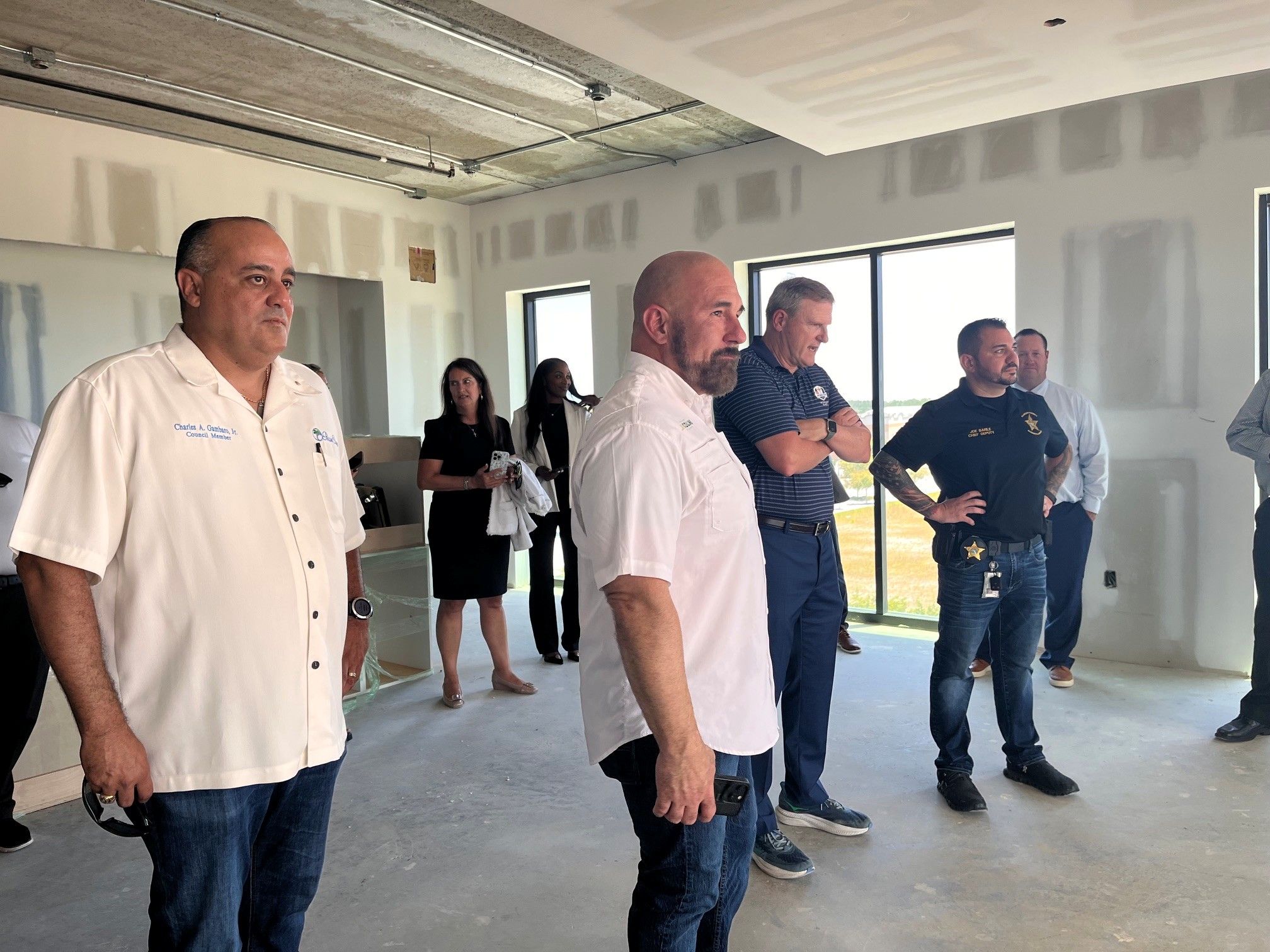 Florida Lieutenant Governor Jay Collins tours the promenade.