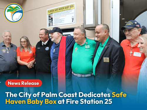 Group photo of City officials, Knights of Columbus, and Kiwanis Members at Fire Station 25 for Safe Haven Baby Box Dedication